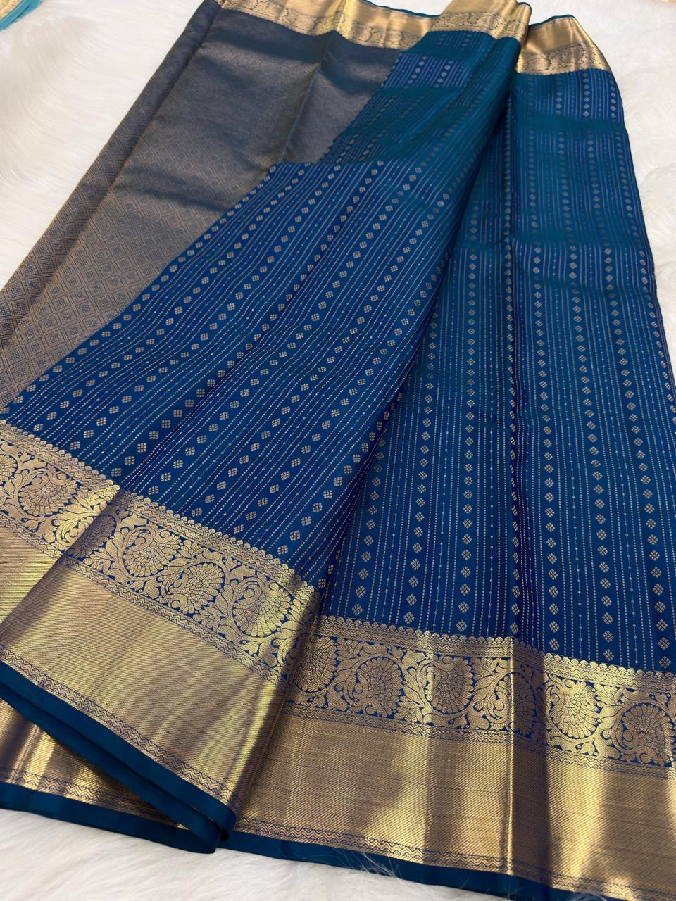 Peacock Blue handwoven pure silk Kanjipuram Butta saree — folded view — Idam Living