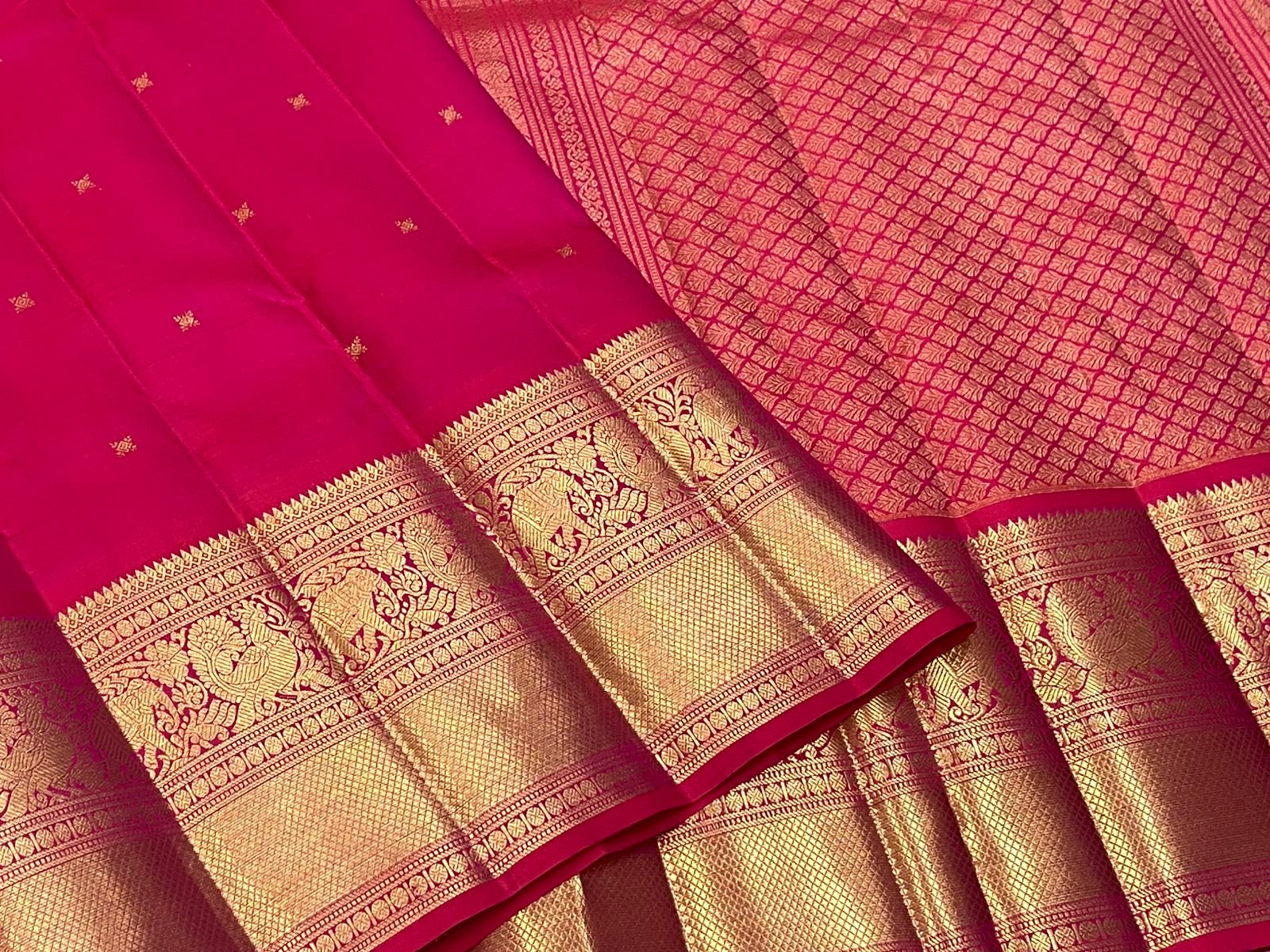 Kanchipuram Butta Raspberry Pink pure silk saree, priced at 15500 rupees