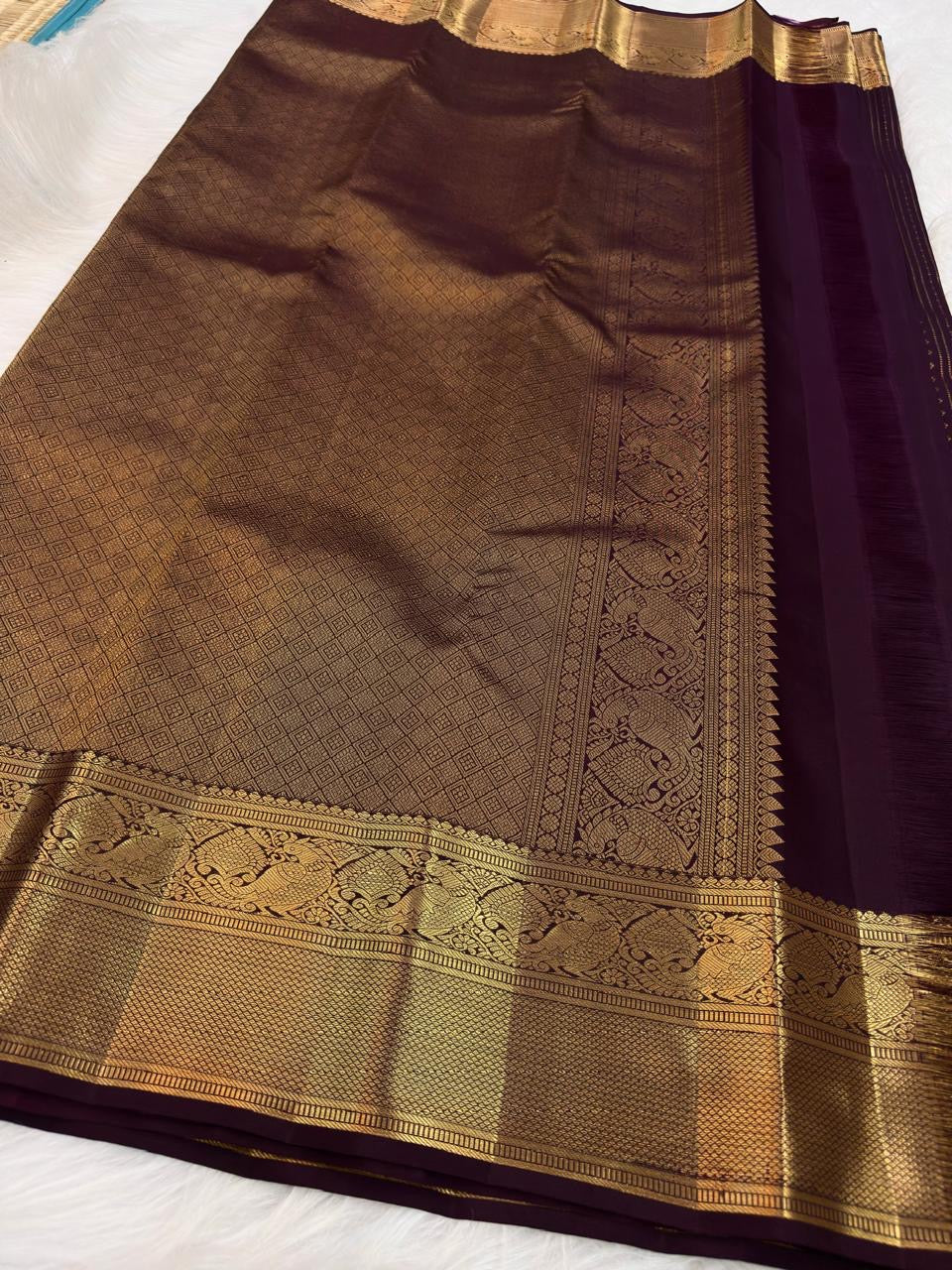 Aubergine handwoven pure silk KanchiPattu Butta saree — pure silk texture close-up — Idam Living