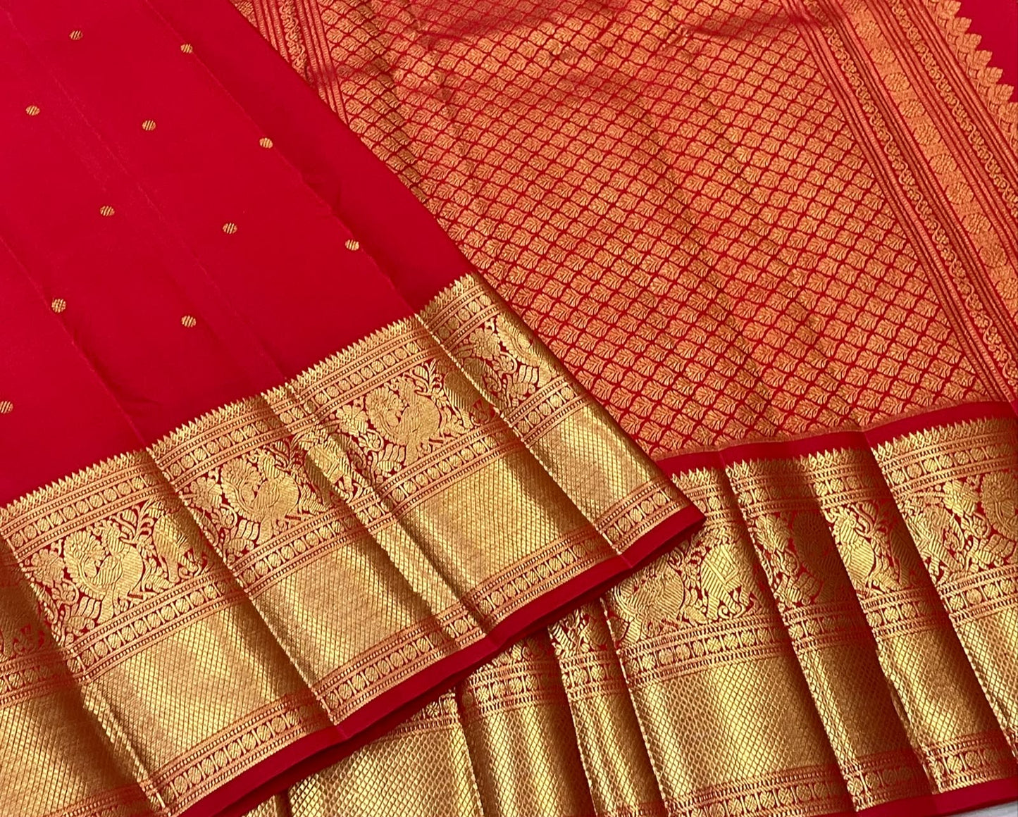 Vermilion Red pure silk KanchiPattu Butta saree folded, Silk Mark certified, handwoven in Kunnam village