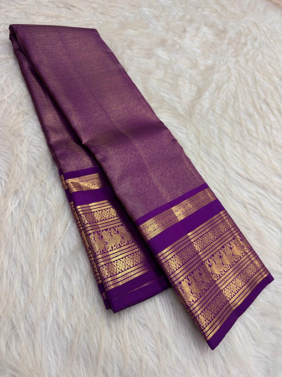 Royal oodha purple and deep aubergine Kanchipuram zari kattam silk sarees, showing body, border and detailed gold zari pallu