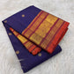 Deep Oodha blue Kanchipuram handloom silk Zari Kattam saree with copper-gold pallu draped for a sumangali prarthanai