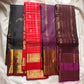 Oodha magenta Kanchipuram Zari Kattam silk saree worn at a temple annadanam