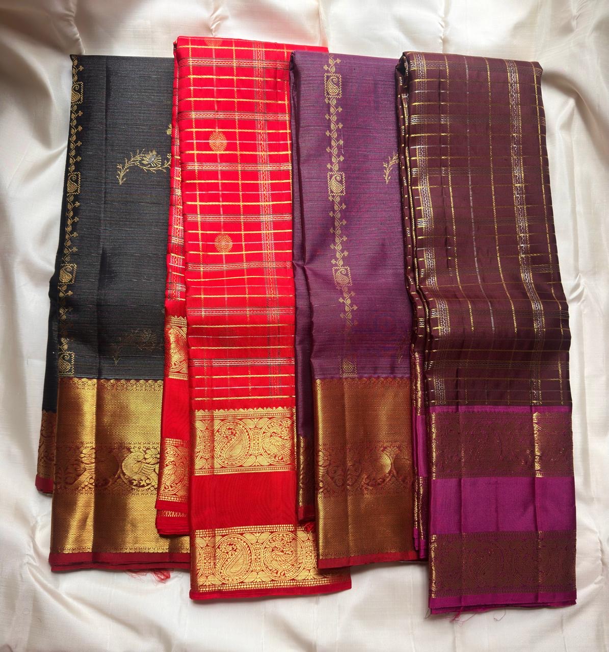 Oodha magenta Kanchipuram Zari Kattam silk saree worn at a temple annadanam