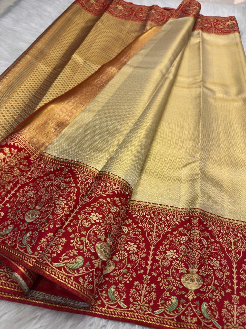Sandalwood ivory handwoven pure silk Banarasi-Kanchipuram fusion saree with champagne-gold zari and vermilion-red floral urn and bird border
