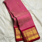 Rose pink pure silk Kanjeevaram Korvai saree with delicate zari buttas, full drape view