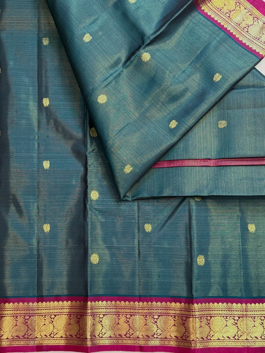 Steel-blue Vairaoosi Kanchipuram saree with fine zari lines and small gold buttas