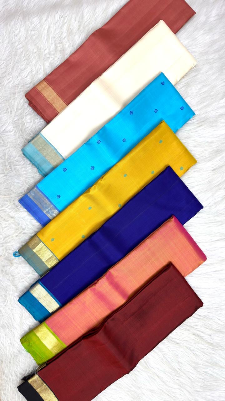 Selection of Simple & Elegant Kanchipuram silk sarees with slim zari borders from Idam Living