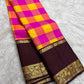 Vintage vivid magenta pink Paalum Pazhamum Kanchipuram silk saree showing draped body border and ornate zari border