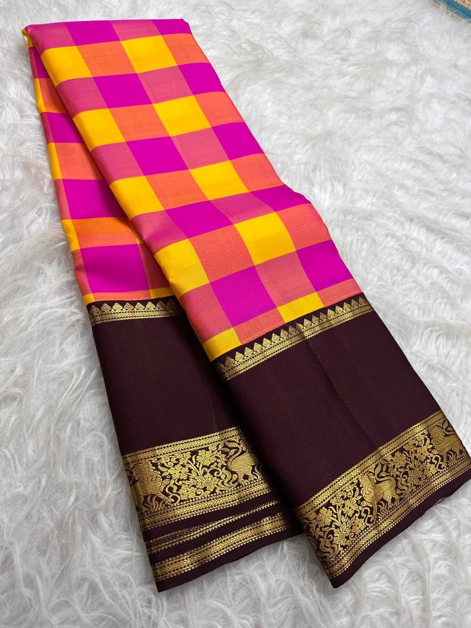 Vintage vivid magenta pink Paalum Pazhamum Kanchipuram silk saree showing draped body border and ornate zari border
