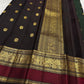 Green Kanjivaram saree with korvai border red contrast detail close up