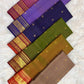 Deep Oodha blue Pure Kanchipuram Silk Zari Kattam saree displayed at a traditional textile exhibition
