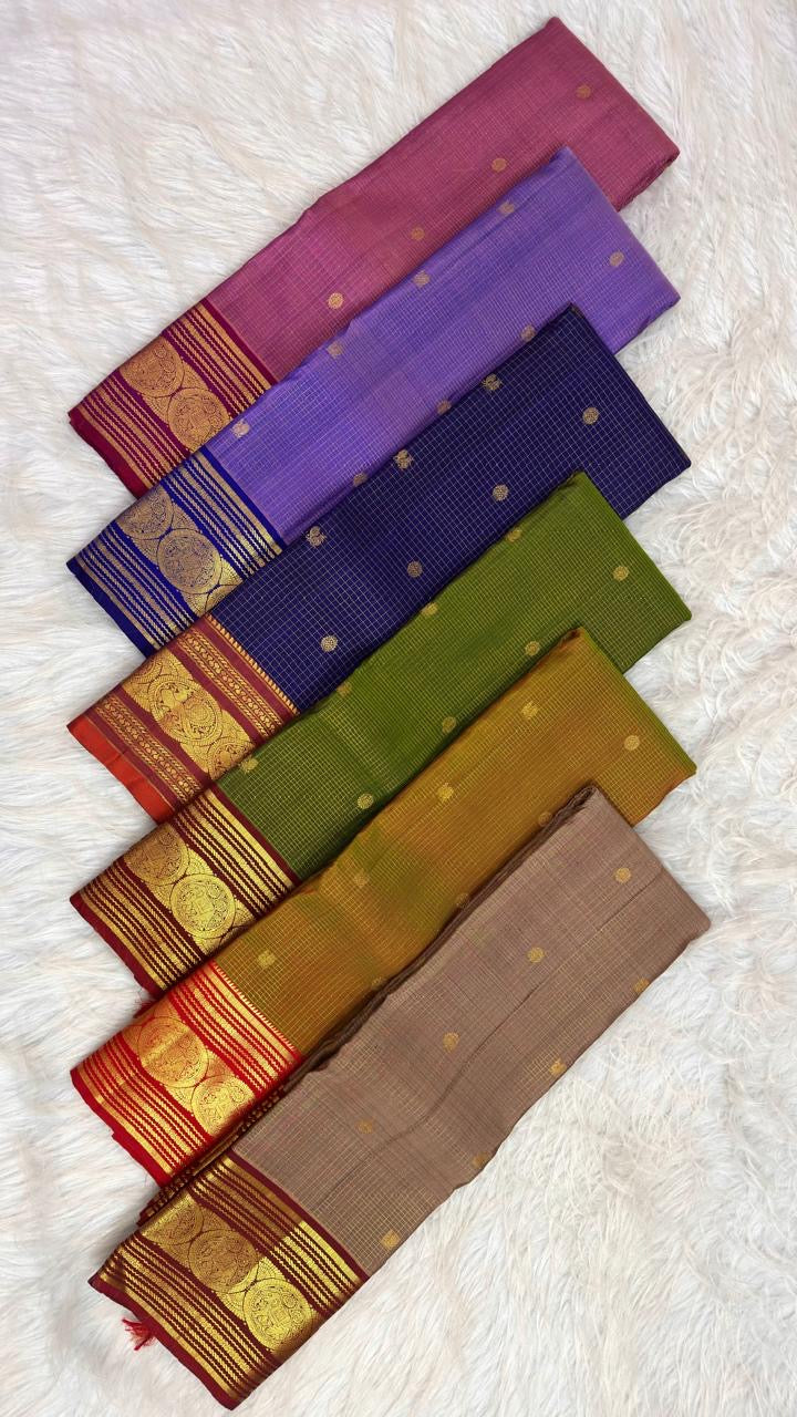 Deep Oodha blue Pure Kanchipuram Silk Zari Kattam saree displayed at a traditional textile exhibition