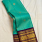 Aqua Vairaoosi pure silk Kanchipuram saree with gold buttas and purple Kai Korvai Varisaipet border, Idam Living (photo 1 of 5)