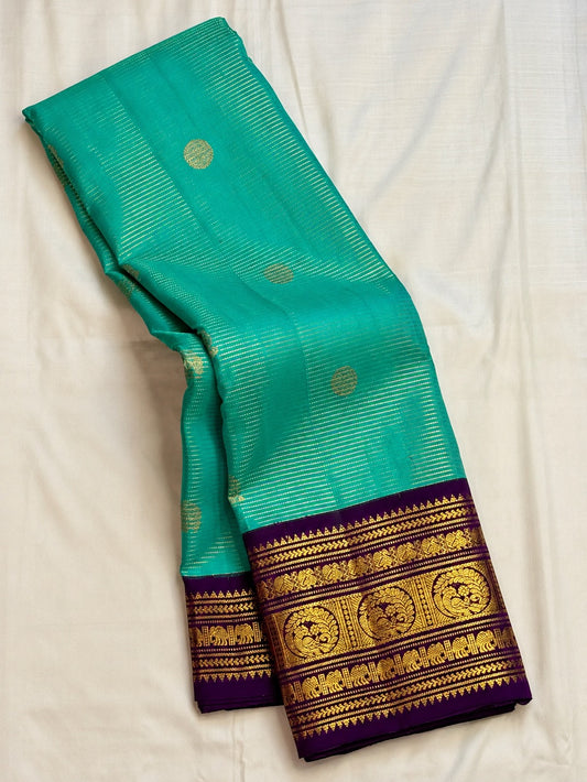 Aqua Vairaoosi pure silk Kanchipuram saree with gold buttas and purple Kai Korvai Varisaipet border, Idam Living (photo 1 of 5)
