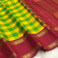 Deep kungumam red Rettapet border with Rudraksham detail beside manjal yellow kattam silk on a handwoven Kanchipuram saree