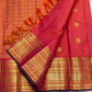 Varisaipet border with Rudraksham detail on a coral and sunset orange Kanchipuram Zari Kattam saree