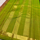 Vadamalli pink and tender leaf green Kanchipuram silk saree with narrow gold border and striped green zari pallu