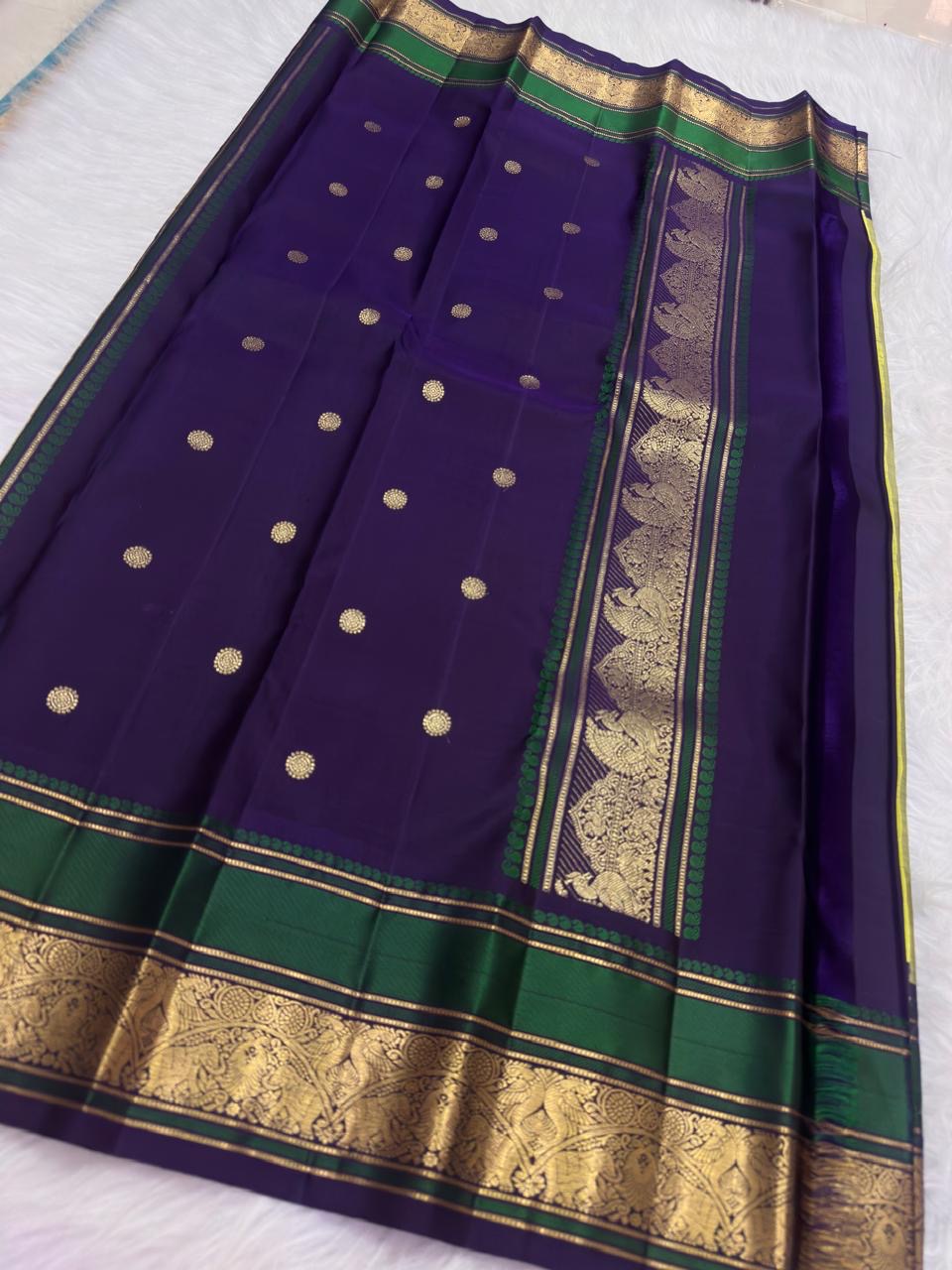 Ornate zari pallu detail on sage olive green pure silk KanchiPattu saree