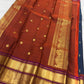 Richly ornamented zari pallu detail on peacock blue pure silk Kanchipuram saree