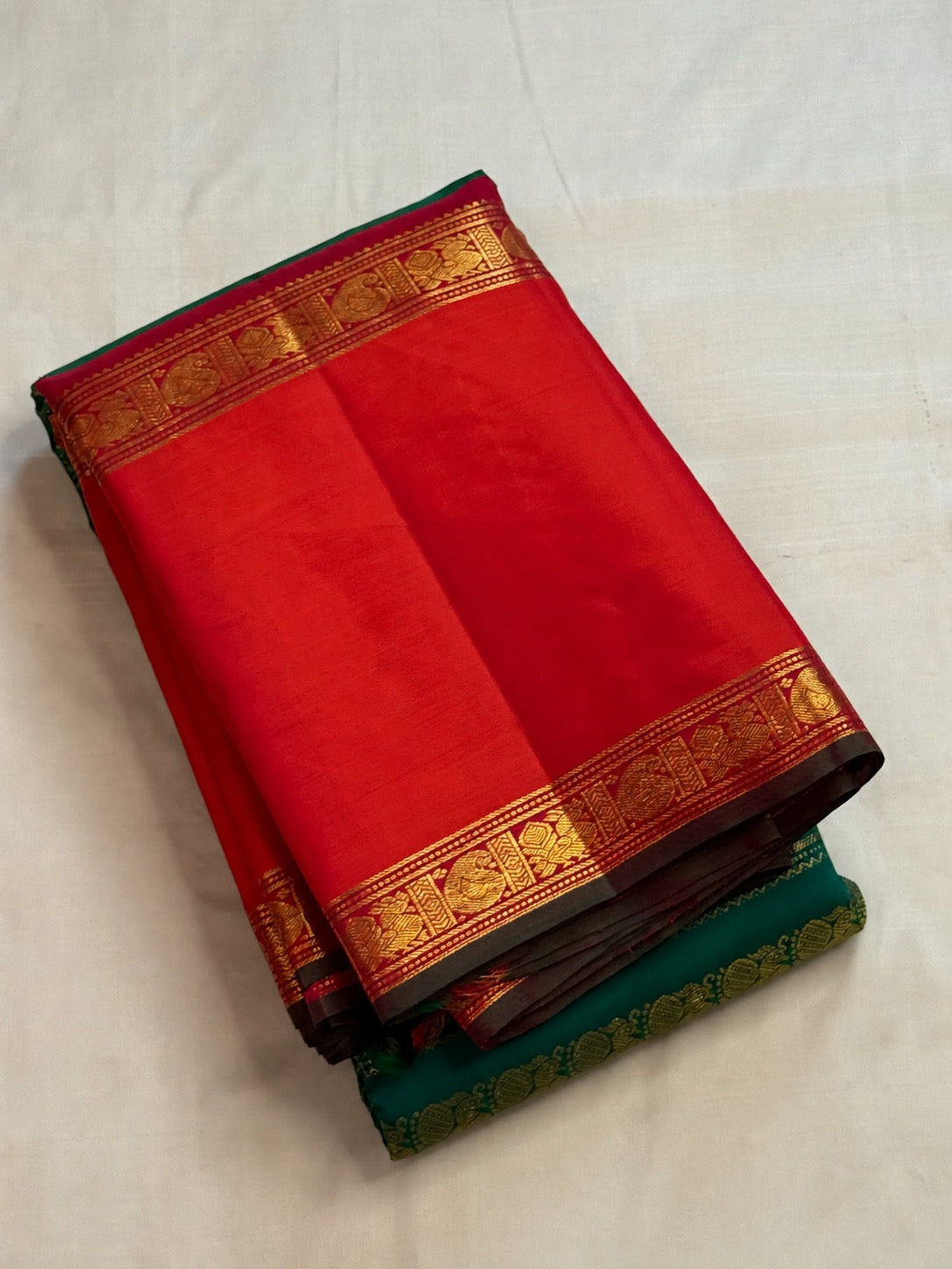 Zari motif detail on a peacock-green pure silk Kanchipuram saree, Idam Living (photo 4 of 8)