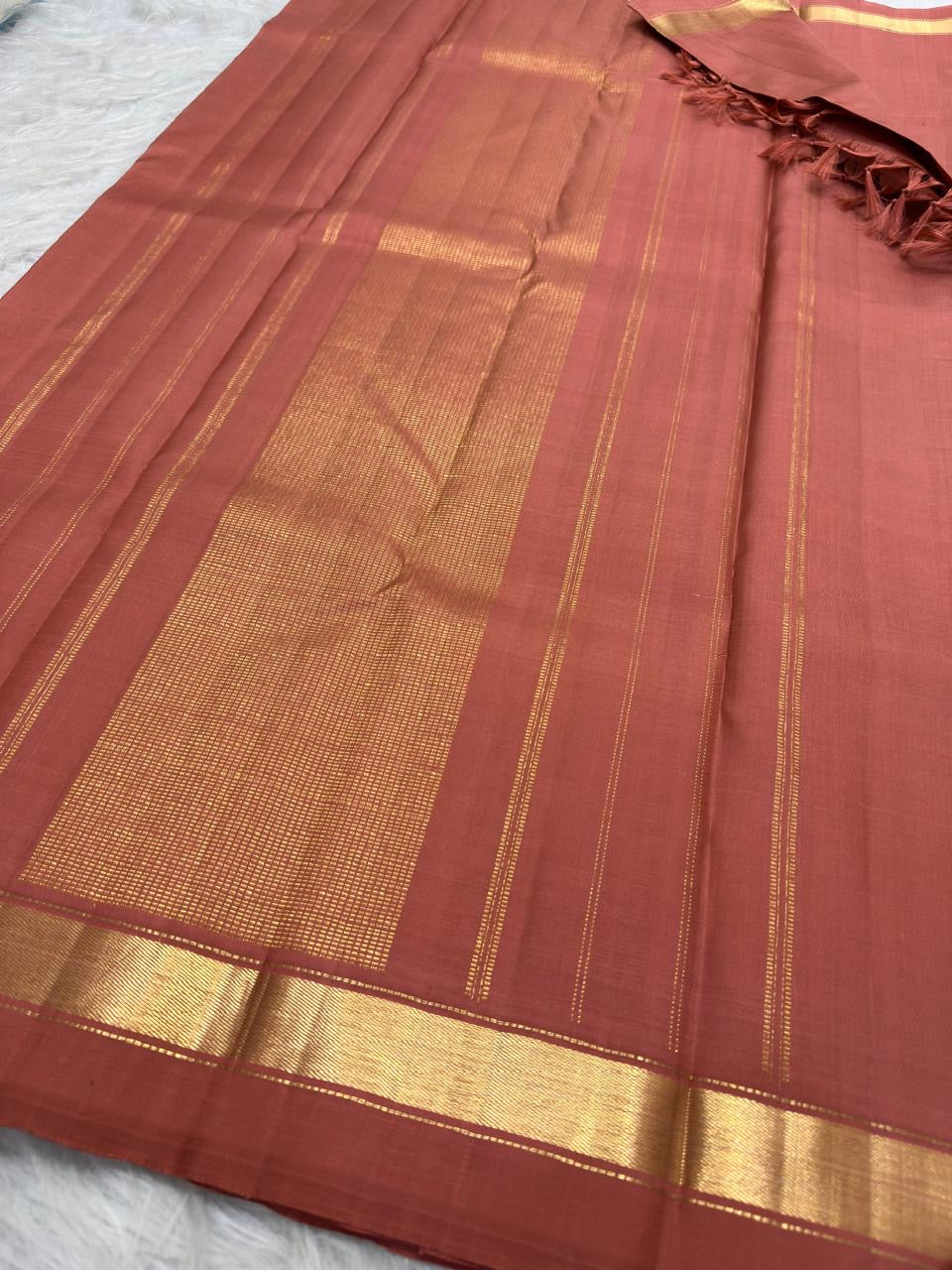Muted Arakku rose slim-border Kanchipuram silk saree by Idam Living