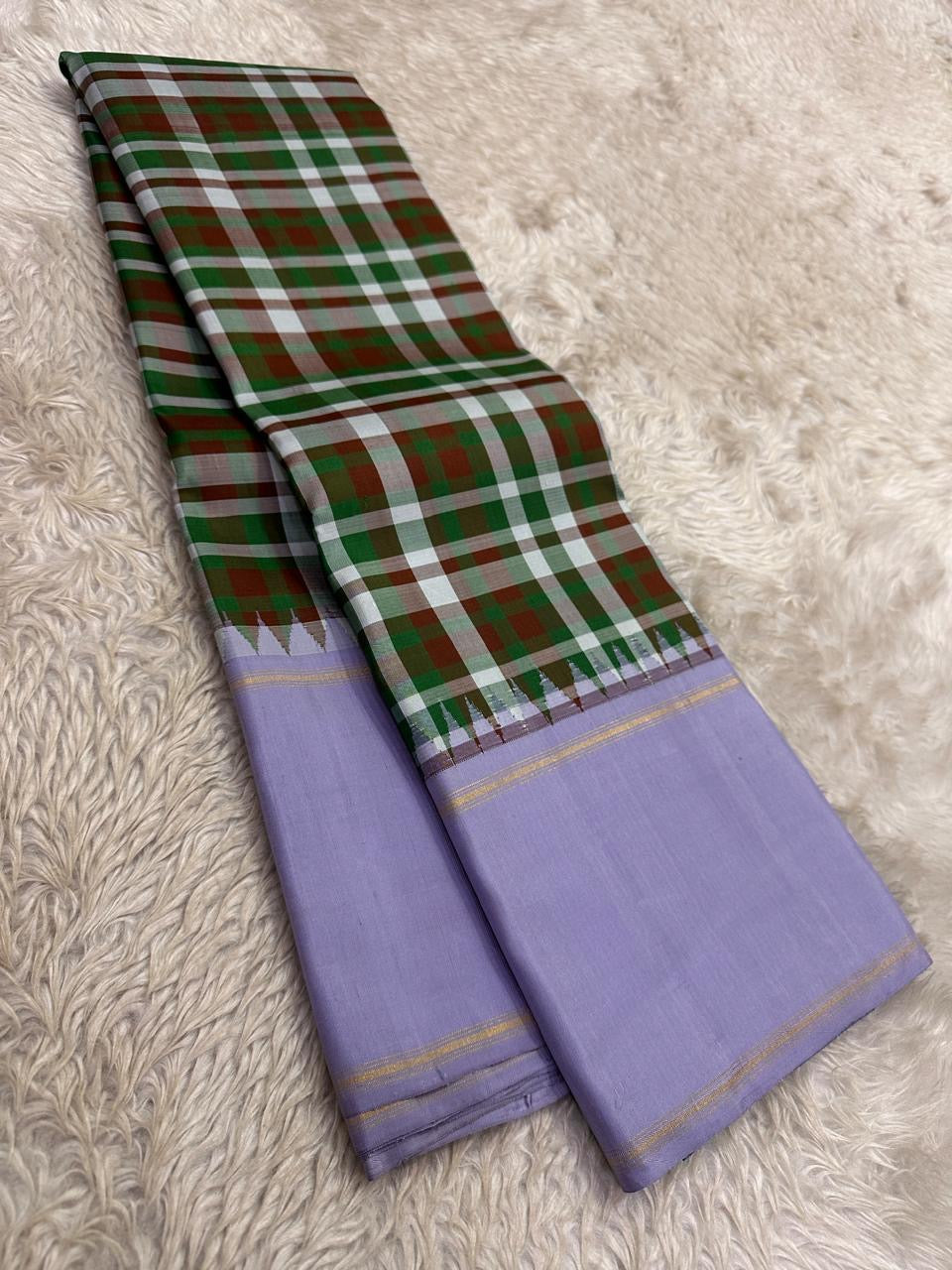 Mullai-lavender Kanchi Kattam Kanchipuram silk saree with green, ivory and russet checks, styled for a Mother's Day family brunch.