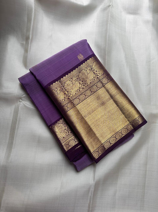 Kanchipuram silk saree amethyst purple with mayil butta folded view