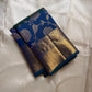 Blue Kanjivaram silk saree with floral butta jaal design draped view