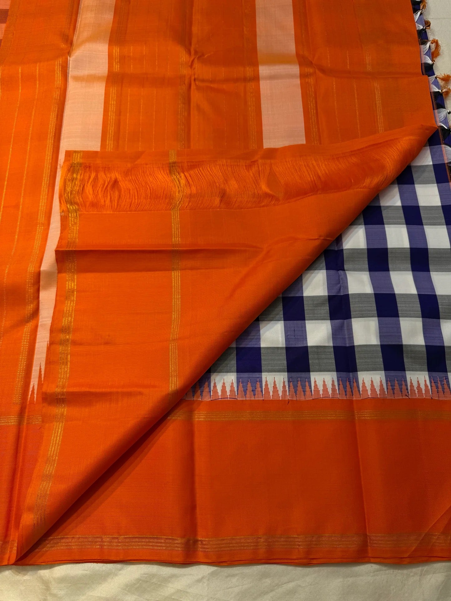 saffron border detail of navy blue Kanchipuram silk saree
