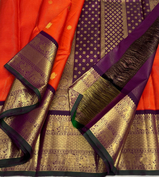 Pure Kanchipuram Silk Saree – Burnt Vermilion Vairaoosi with Royal Plum Border and Antique Gold Mayil Butta