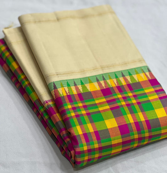 buttercream kanchipuram silk saree with green checks folded view