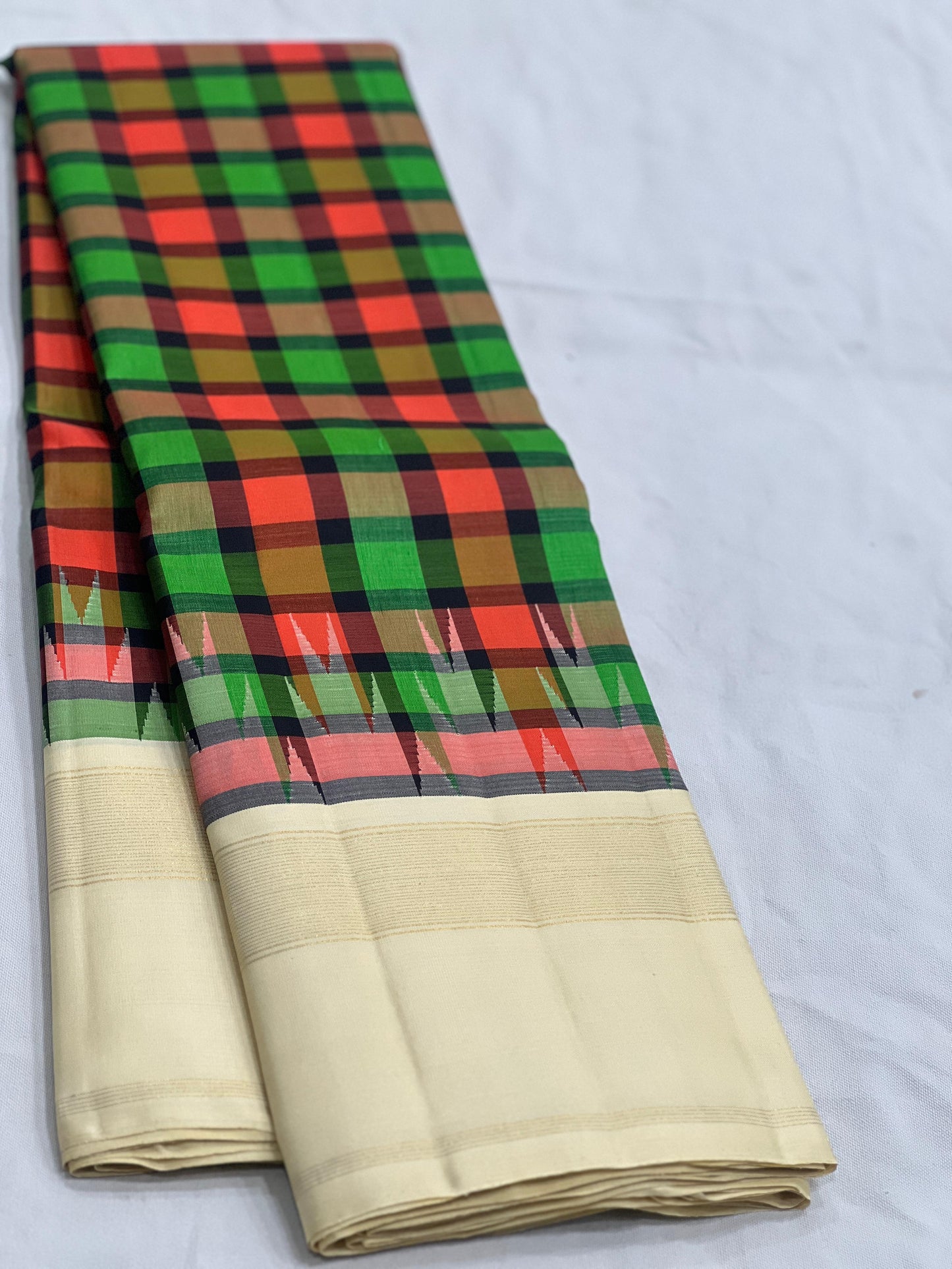 kanjivaram silk saree cream base green coral checks border detail