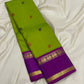 Chartreuse Kanjivaram silk saree with peacock motifs and deep violet zari woven border detail