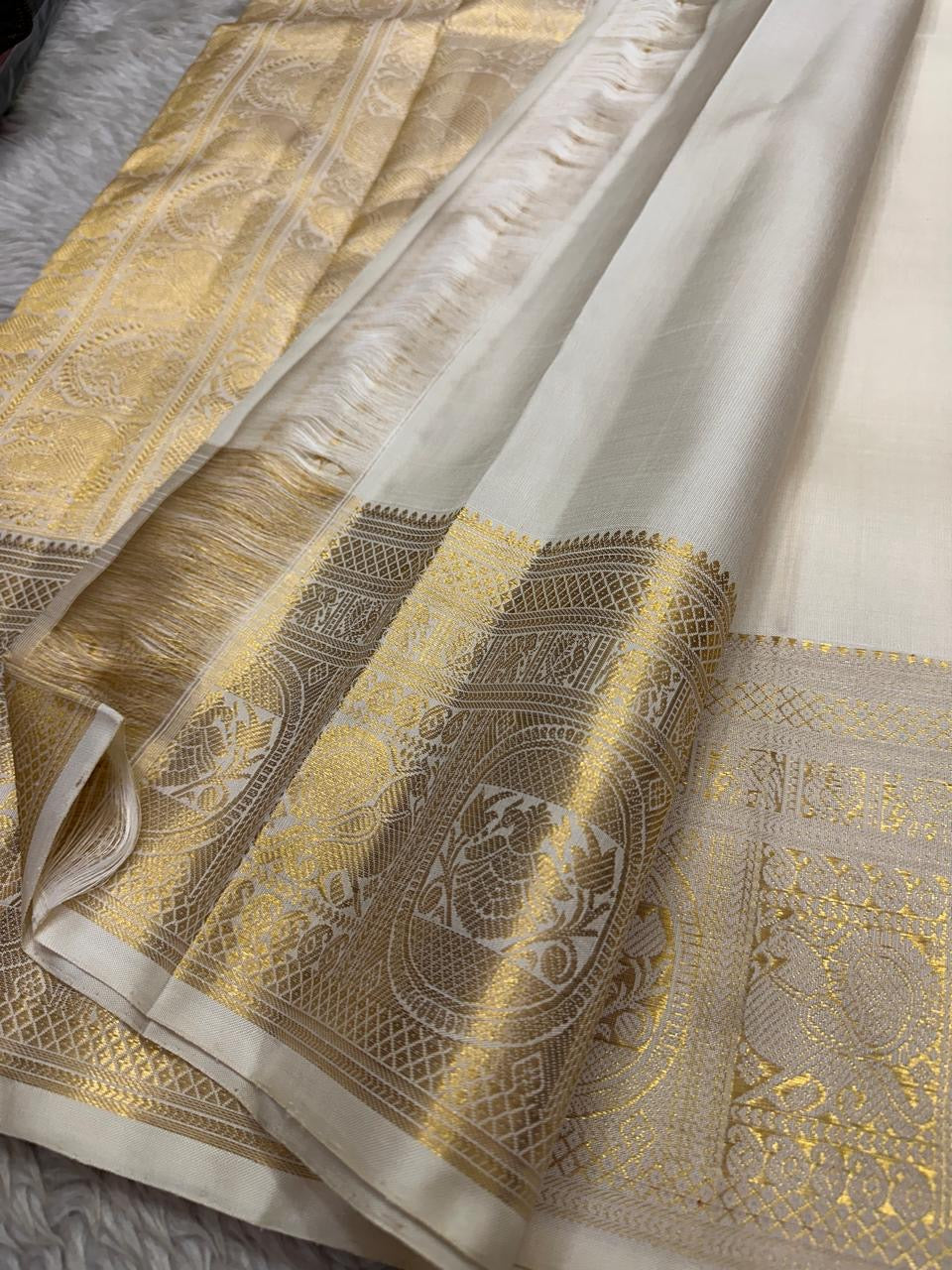 Gold zari pallu with tassels on ivory Pure Kanchipuram Silk Saree, shipped from New Jersey USA.