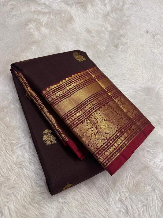Cocoa brown Kanchipuram silk saree with gold yaanai butta folded view