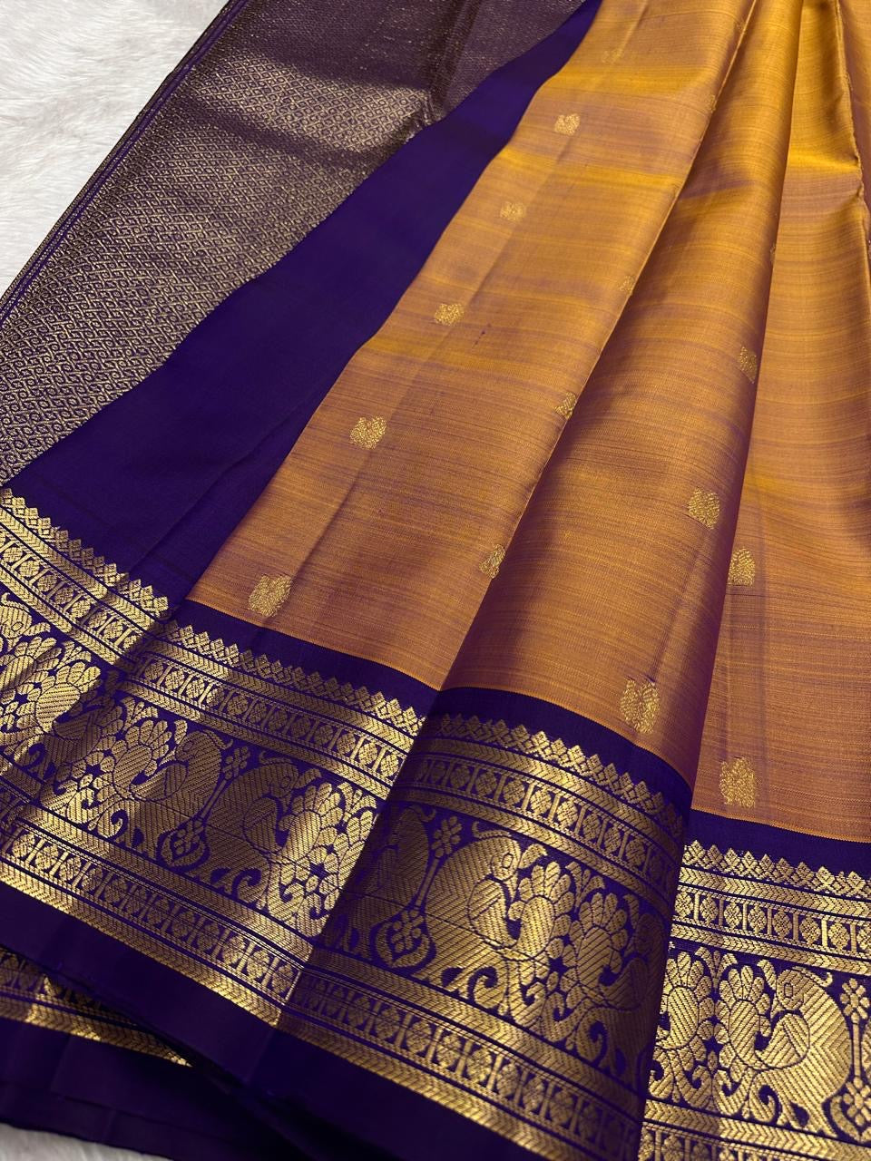 burnt copper Kanchipuram silk saree with kv-myb weave folded view