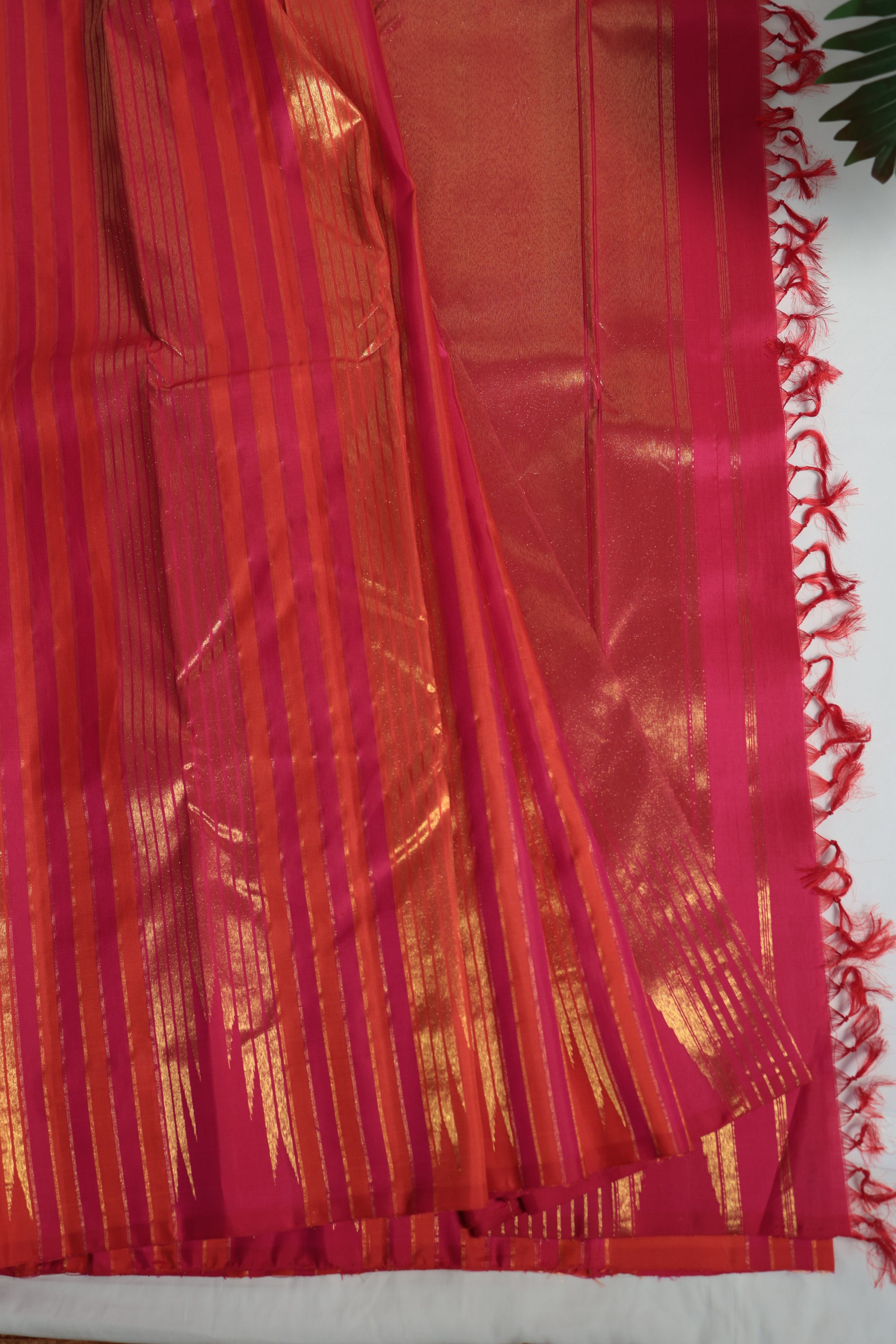 Traditional Pure Kanchipuram silk saree crafted with Ettukol weaving, displaying a structured silk body and luminous antique gold zari characteristic of heritage weaving