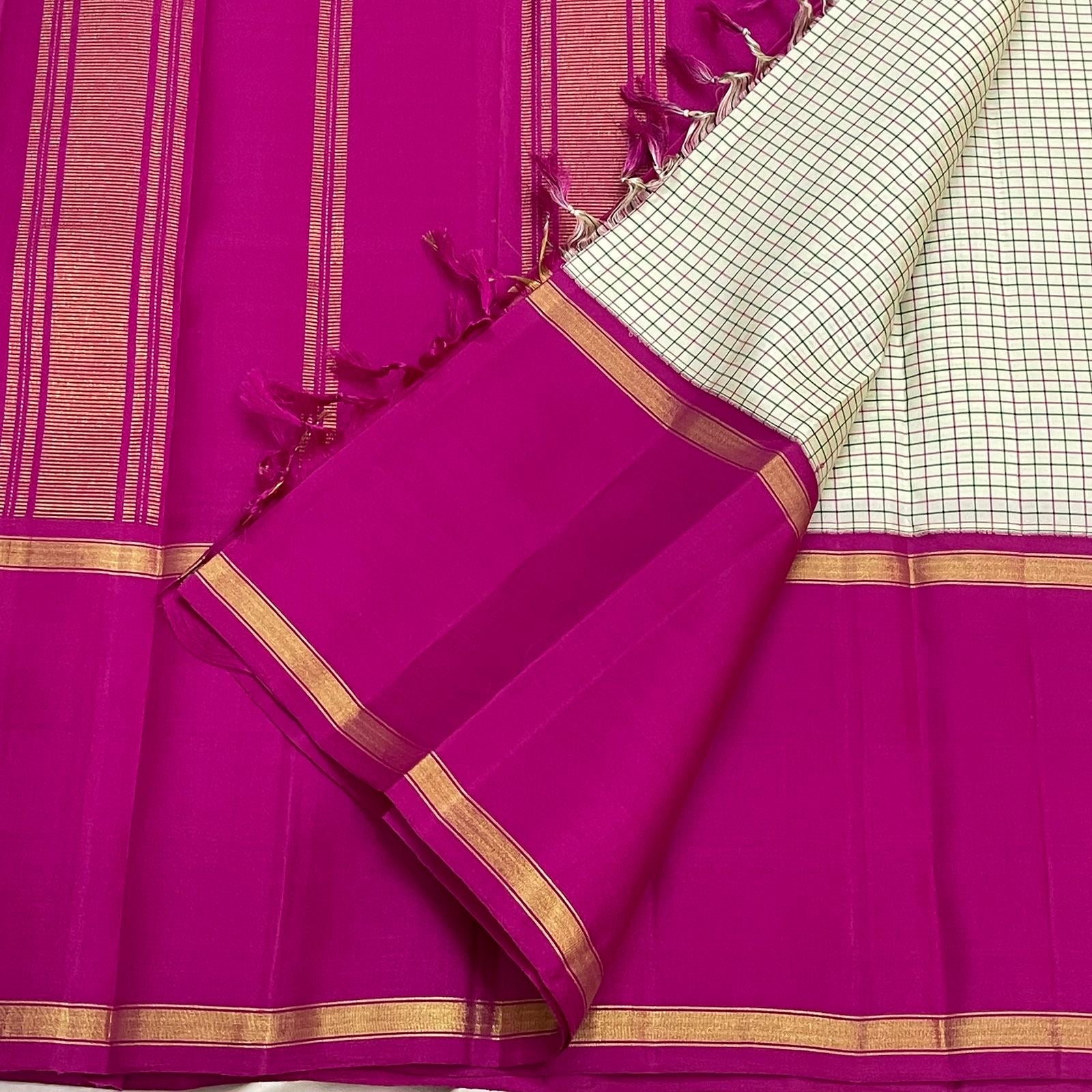 Kanjivaram silk saree cream white full view with check pattern and contrast border
