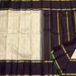 White Kanchipuram silk saree border detail with purple band and green selvedge