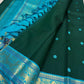 turquoise border detail of deep green Kanchipuram silk saree
