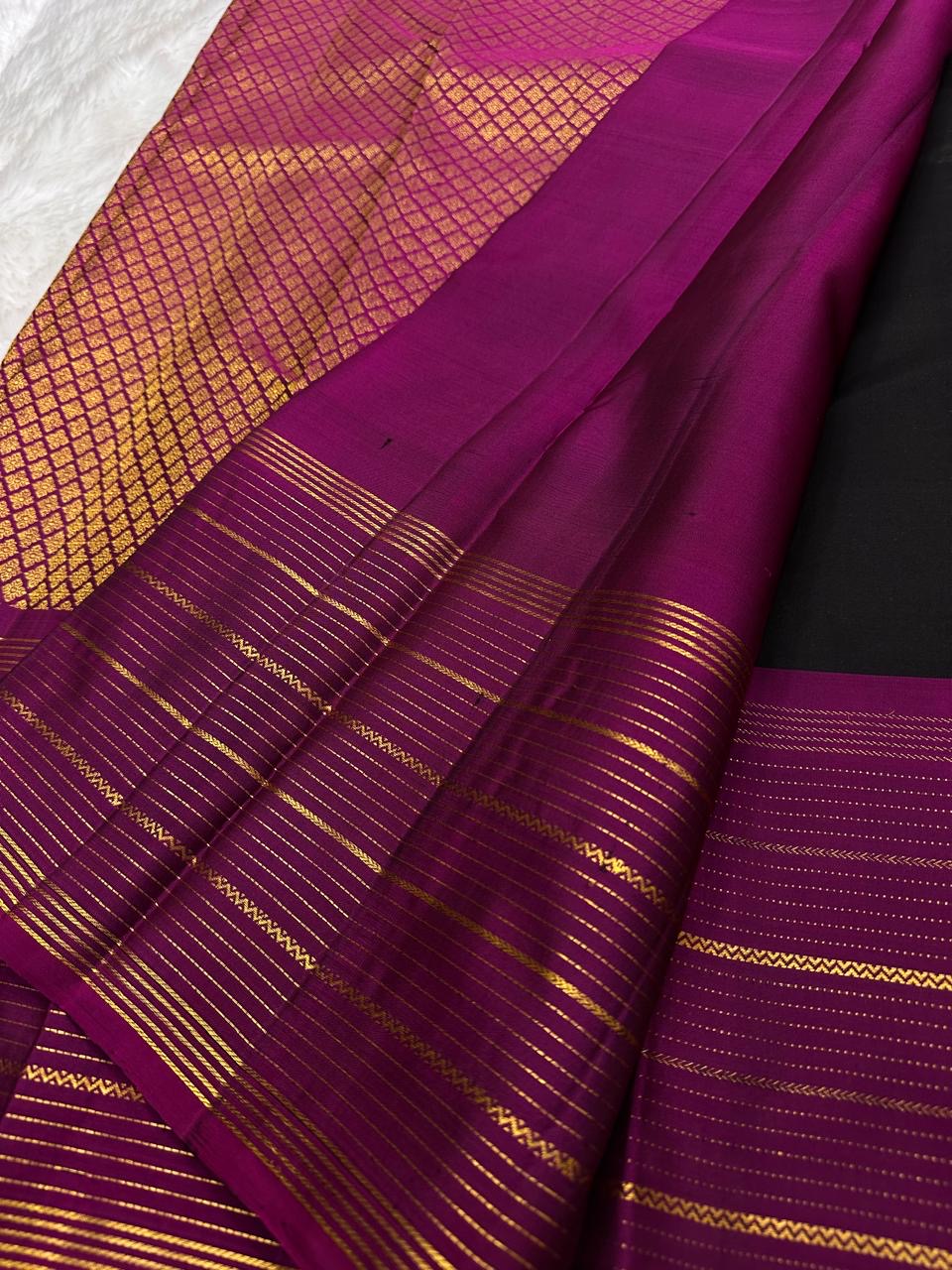 luxury black kancheevaram silk saree peacock motifs zari detail close up