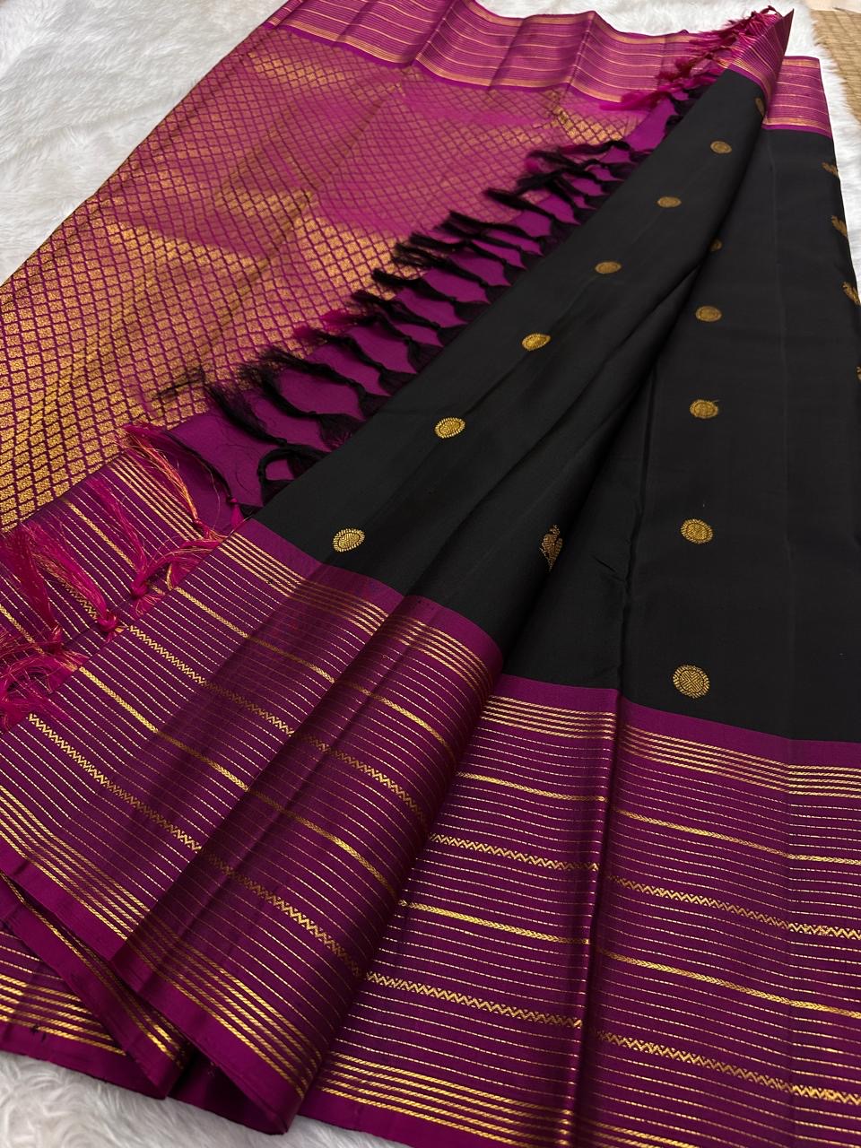 black kanchipuram pattu saree gold zari butta border and body detail