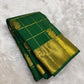 gold border detail of emerald green Kanchipuram silk saree