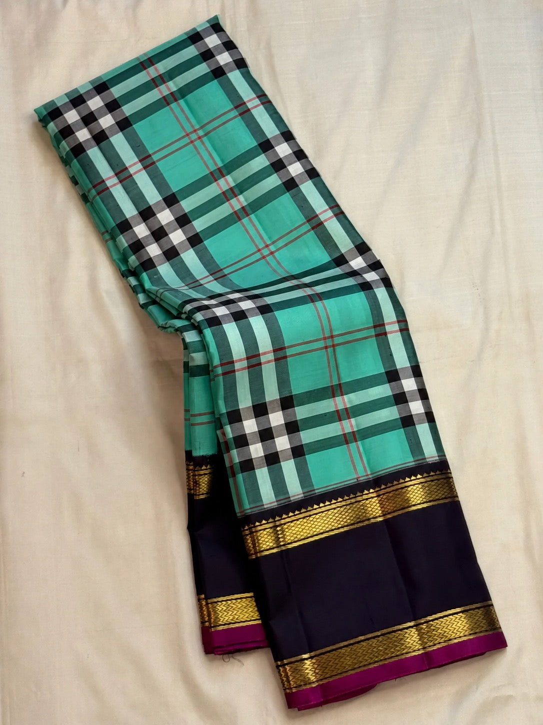 Lagoon turquoise Paapli checks pure silk Kanchipuram saree with midnight navy Rettapet border and gold Seer pallu, Idam Living (photo 5 of 5)