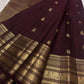 Espresso brown pure silk Kanchipuram saree with antique gold mayil chakram buttas, peacock-green detailing, and a detailed peacock and arai maadam pallu, view 3.