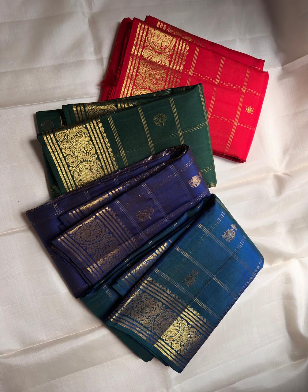 Kanjeevaram silk saree gold zari border on green silk base