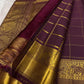 Kanchipuram silk saree zari kattam grid pattern plum closeup