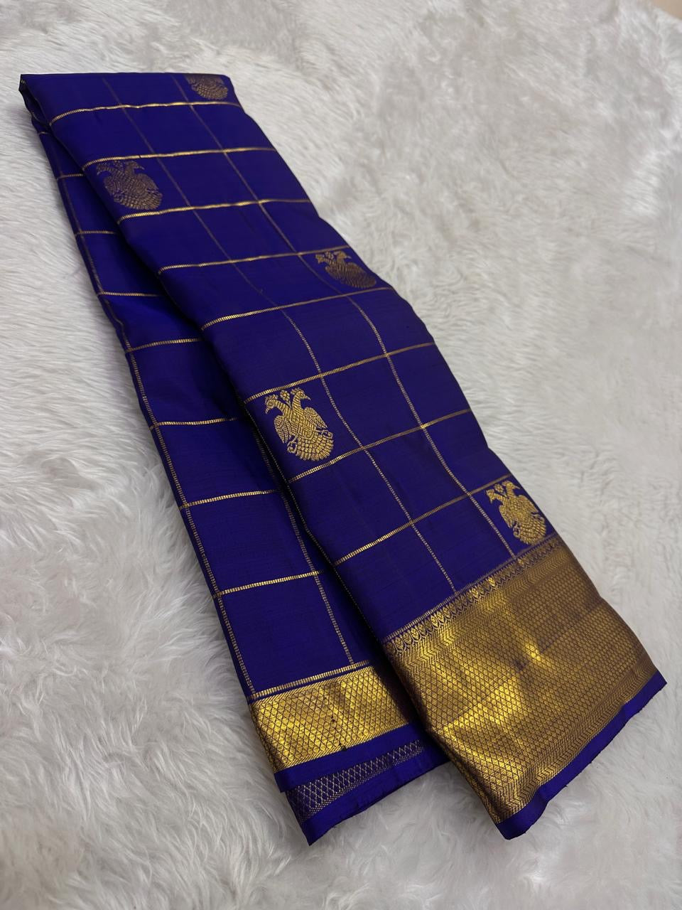 cobalt blue Kanchipuram silk saree with zk-gb weave folded view