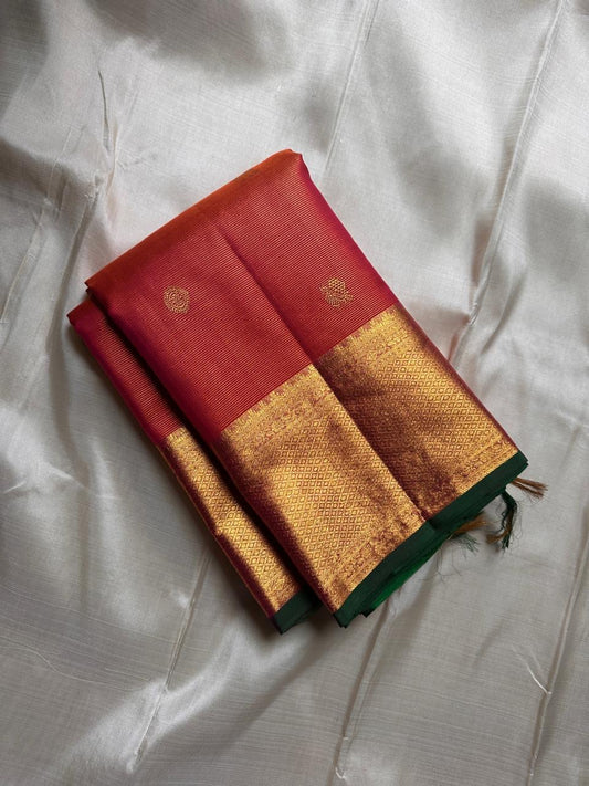 Kanchipuram silk saree paprika red with mayil butta folded view